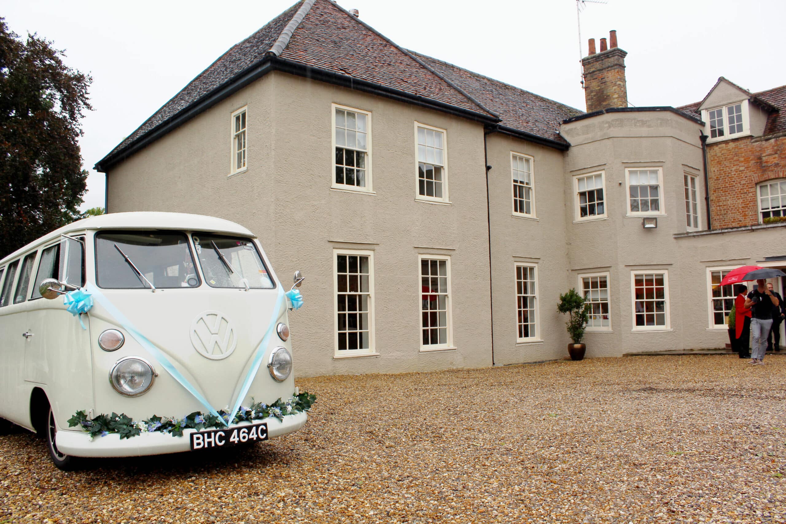 white wedding car outside That Amazing Place venue.