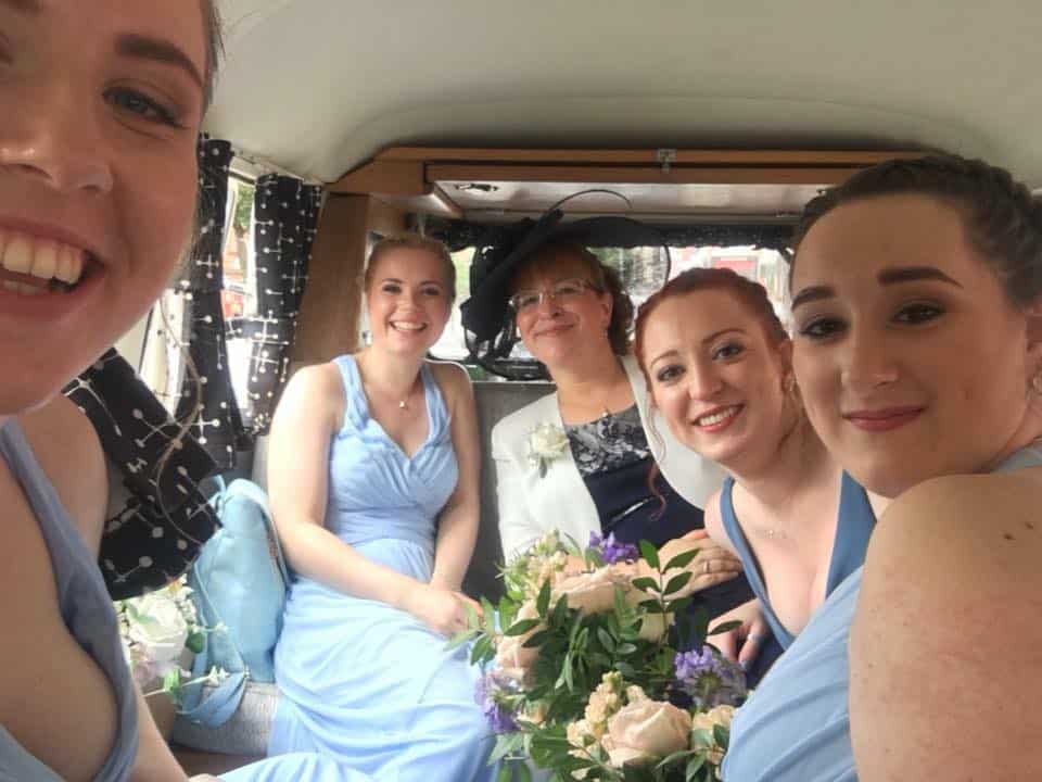 Relaxed wedding journey inside a vintage VW campervan in Surrey
