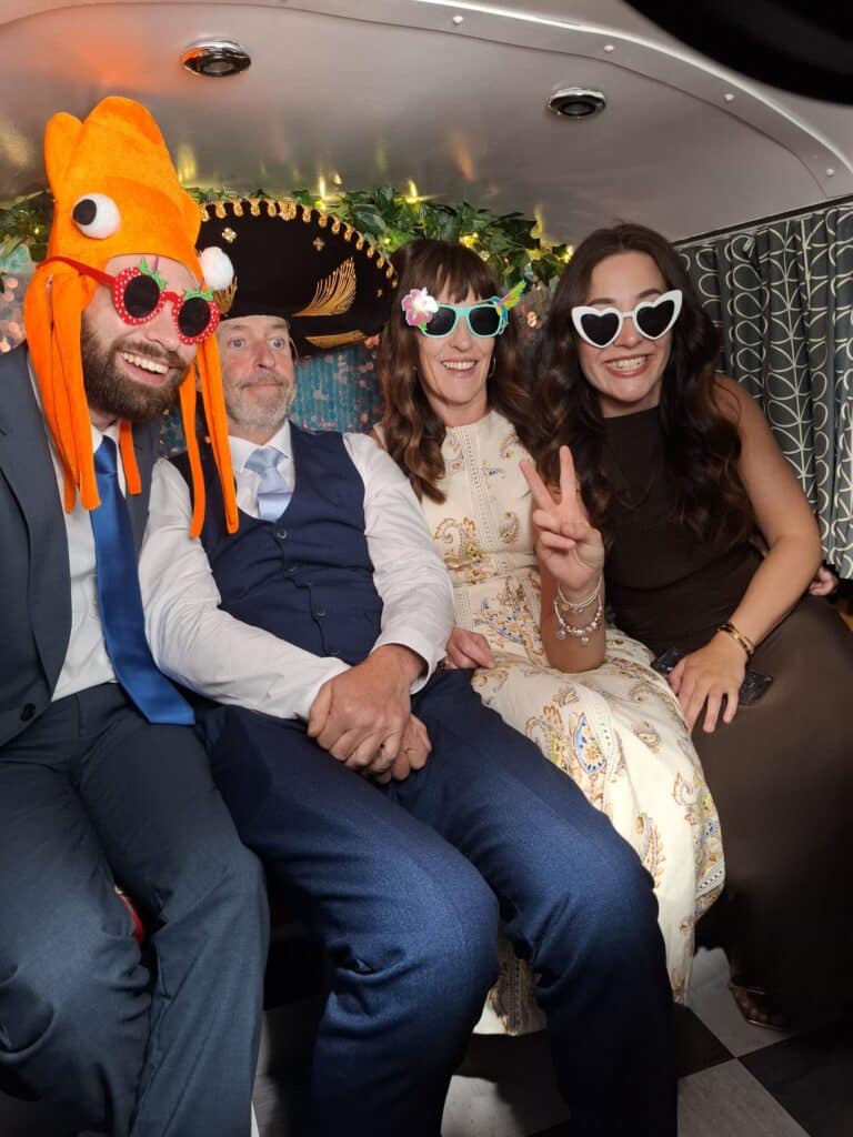 guests posing inside the photo booth