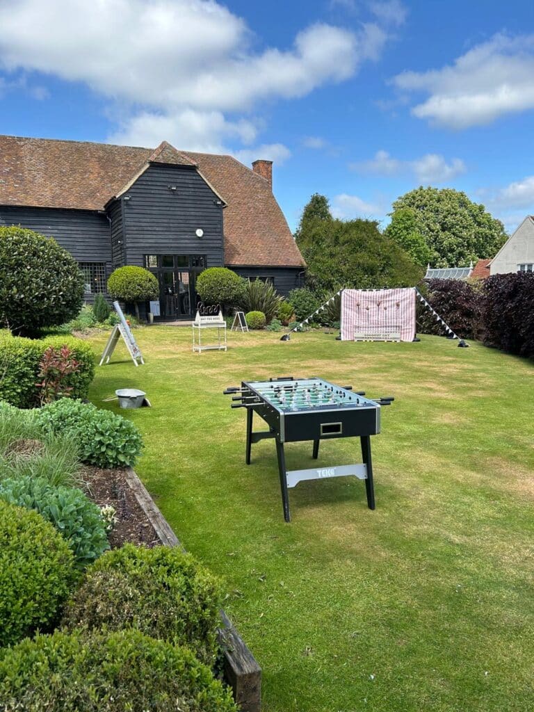 Vintage wedding games set up on the lawn at The Old Kent Barn in Kent