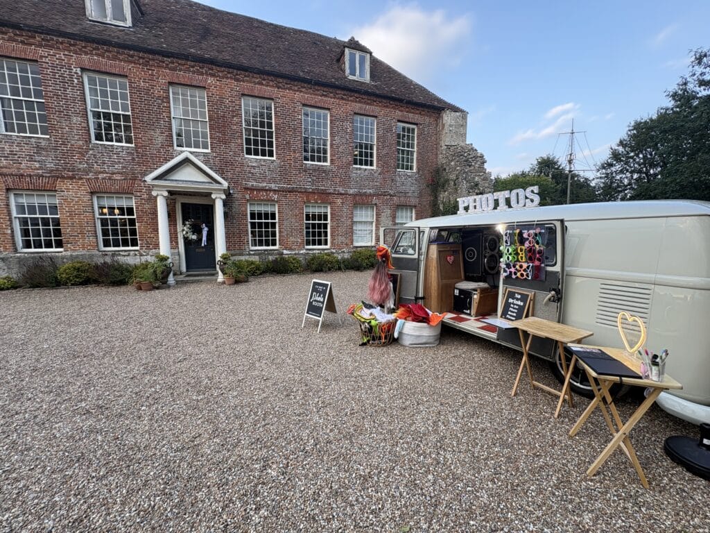 Vintage camper photo booth at a wedding at The Castle Westenhanger in Kent